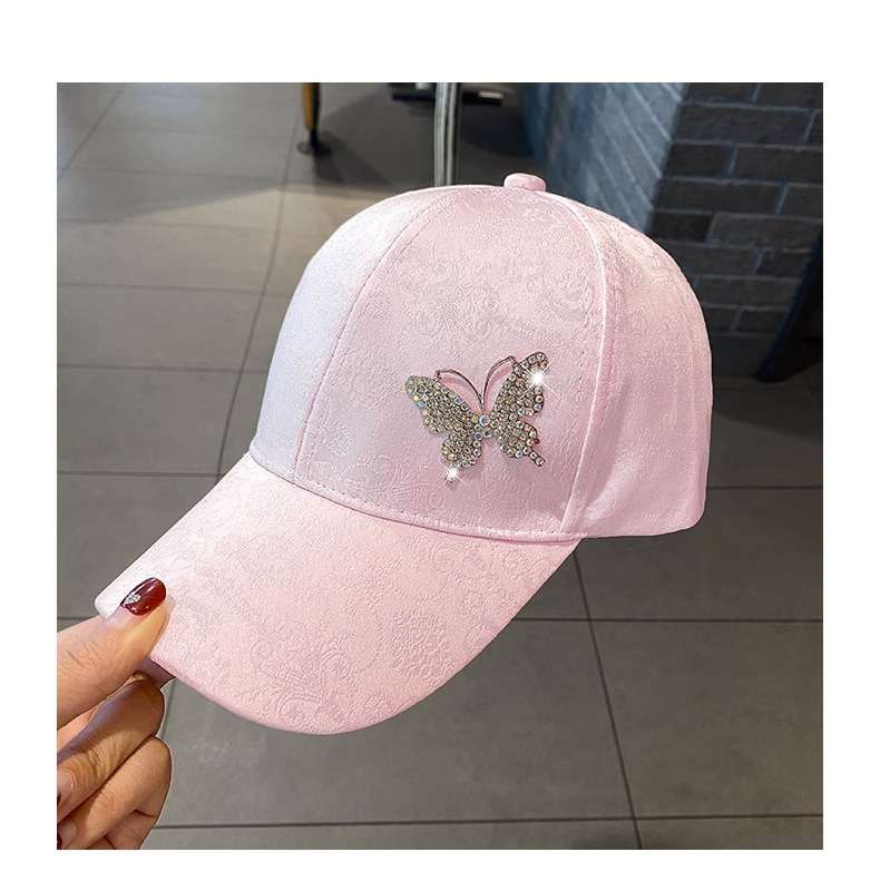 Elegant Cap with Butterfly Embellishment image 0