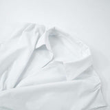 Sleeveless Twist-Front Blouse with Structured Details image 4