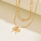 Elegant Gold Bow Pendant Necklace with Layered Chains image 3