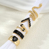 طقم خواتم ذهبية مضادة للتشوه على شكل ثعبان وزمرد