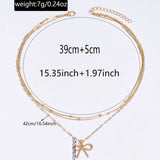 Elegant Gold Bow Pendant Necklace with Layered Chains image 2