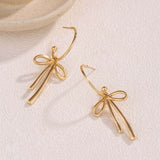 Elegant Gold Bow Tie Dangle Earrings image 1