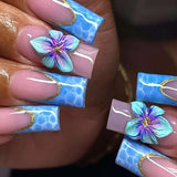 Elegant Nail Art with 3D Floral Design image 0