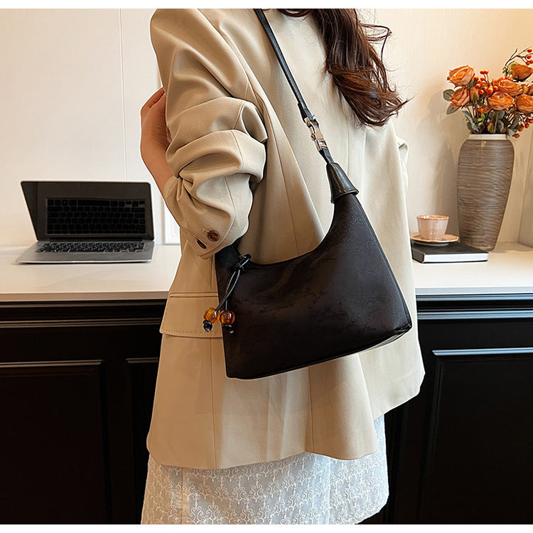 Elegant Handbag with Beaded Accent