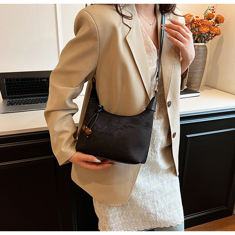 Elegant Handbag with Beaded Accent