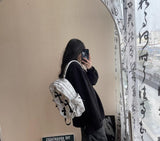 Marbled Backpack with Cross Embellishments