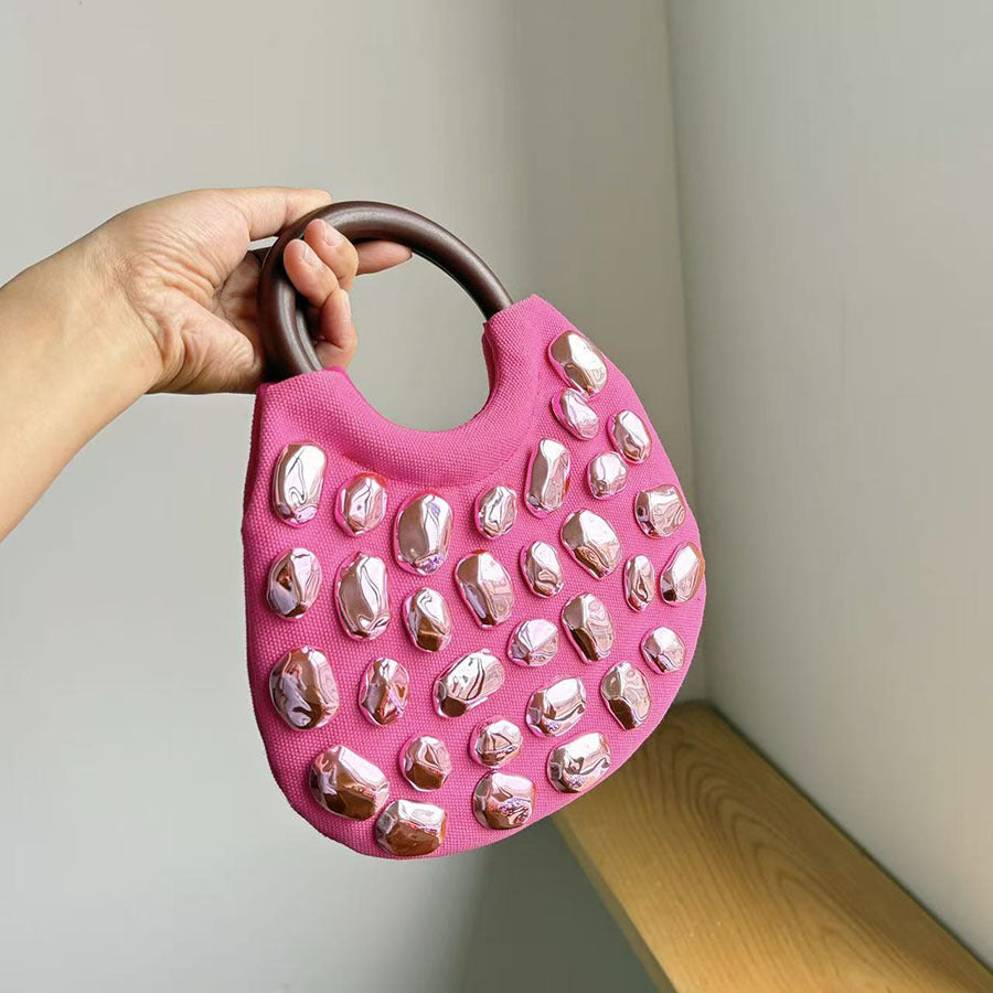 Handbag with Metallic Embellishments