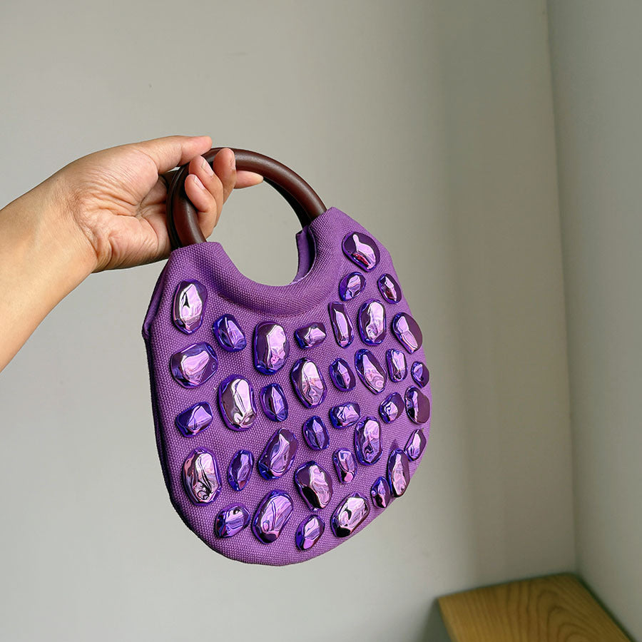 Handbag with Metallic Embellishments
