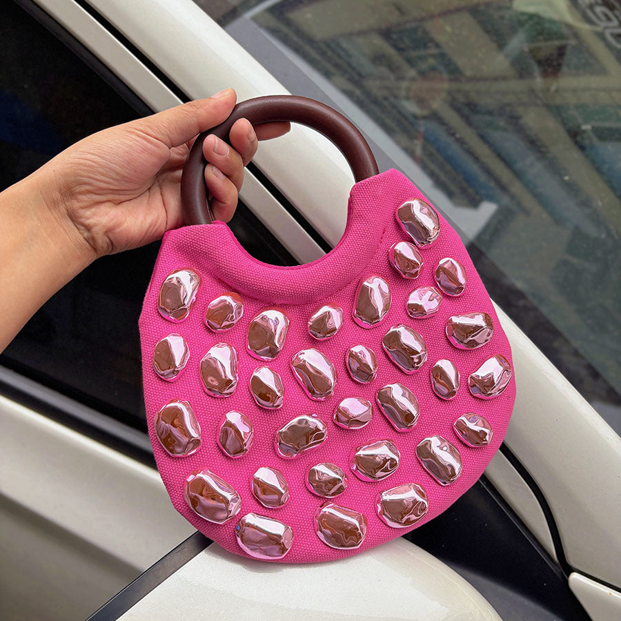 Handbag with Metallic Embellishments