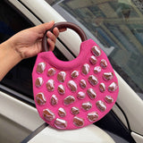 Handbag with Metallic Embellishments