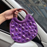 Handbag with Metallic Embellishments