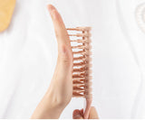 Detangling Hairbrush with Flexible Bristles