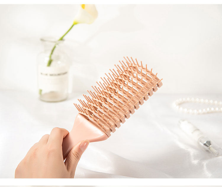 Detangling Hairbrush with Flexible Bristles