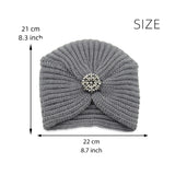 Knitted Turban with Decorative Brooch
