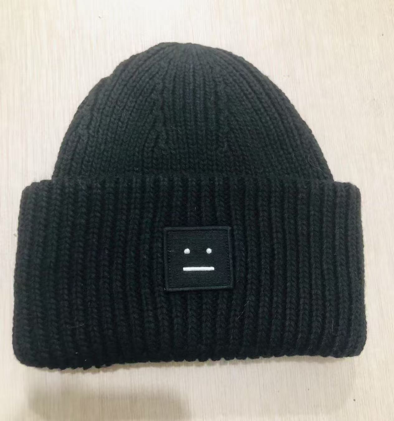 Knit Beanie with Sad Face Patch