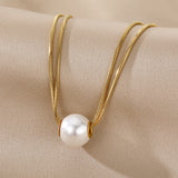 Gold Necklace with Pearl Pendant