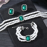 Elegant Pearl and Emerald Jewelry Set