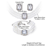 Elegant Pearl and Emerald Jewelry Set