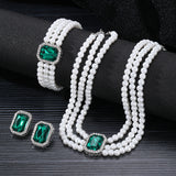 Elegant Pearl and Emerald Jewelry Set