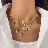 Layered Necklace Set with Bow & Floral Charms