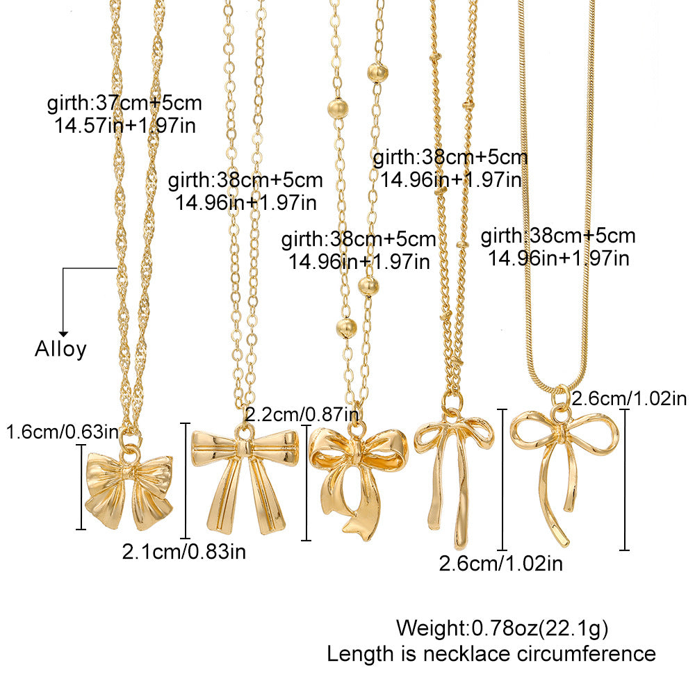 Layered Necklace Set with Bow & Floral Charms