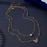 Layered Gold Heart & Bow Pendant Necklace