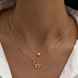 Layered Gold Heart & Bow Pendant Necklace