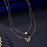Layered Gold Heart & Bow Pendant Necklace