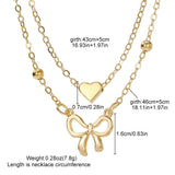 Layered Gold Heart & Bow Pendant Necklace