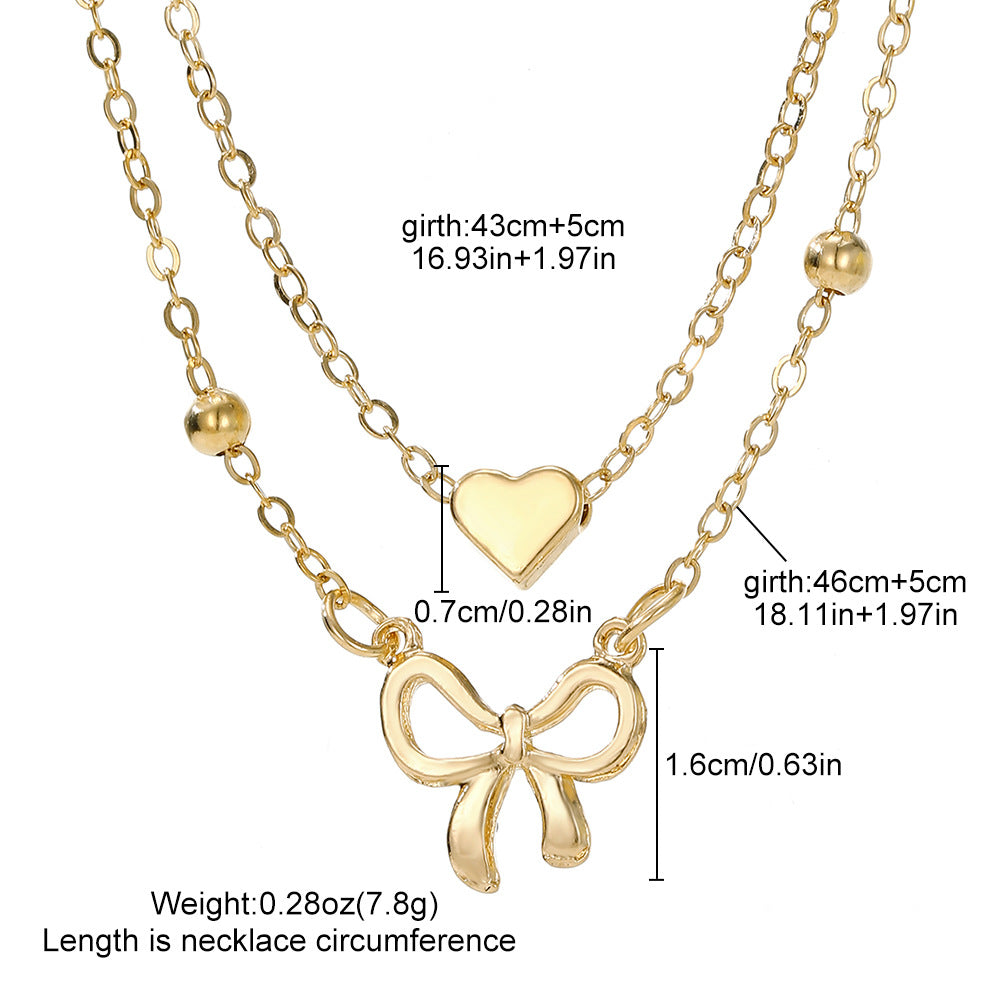 Layered Gold Heart & Bow Pendant Necklace