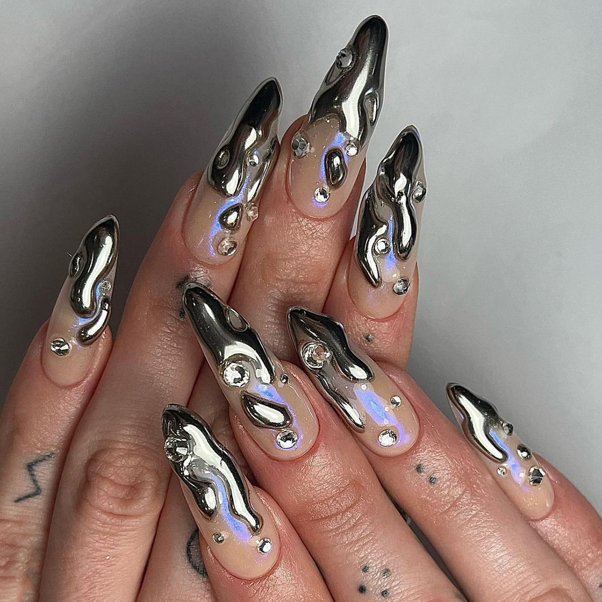 Futuristic Metallic Nail Art