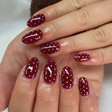 Elegant Nail Art with White Dot Detail