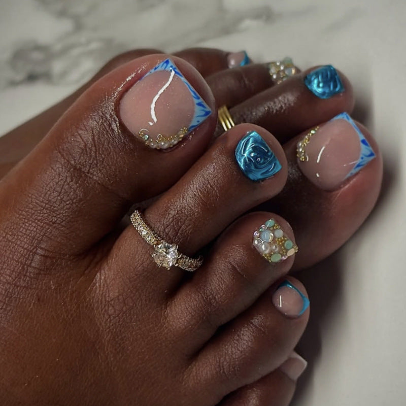 Elegant Nail Art with Blue & Gold Accents