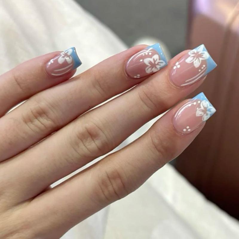 Elegant Nails with Floral and Blue Tips