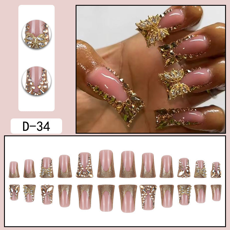 Butterfly and Leaf Embellished Nail Art