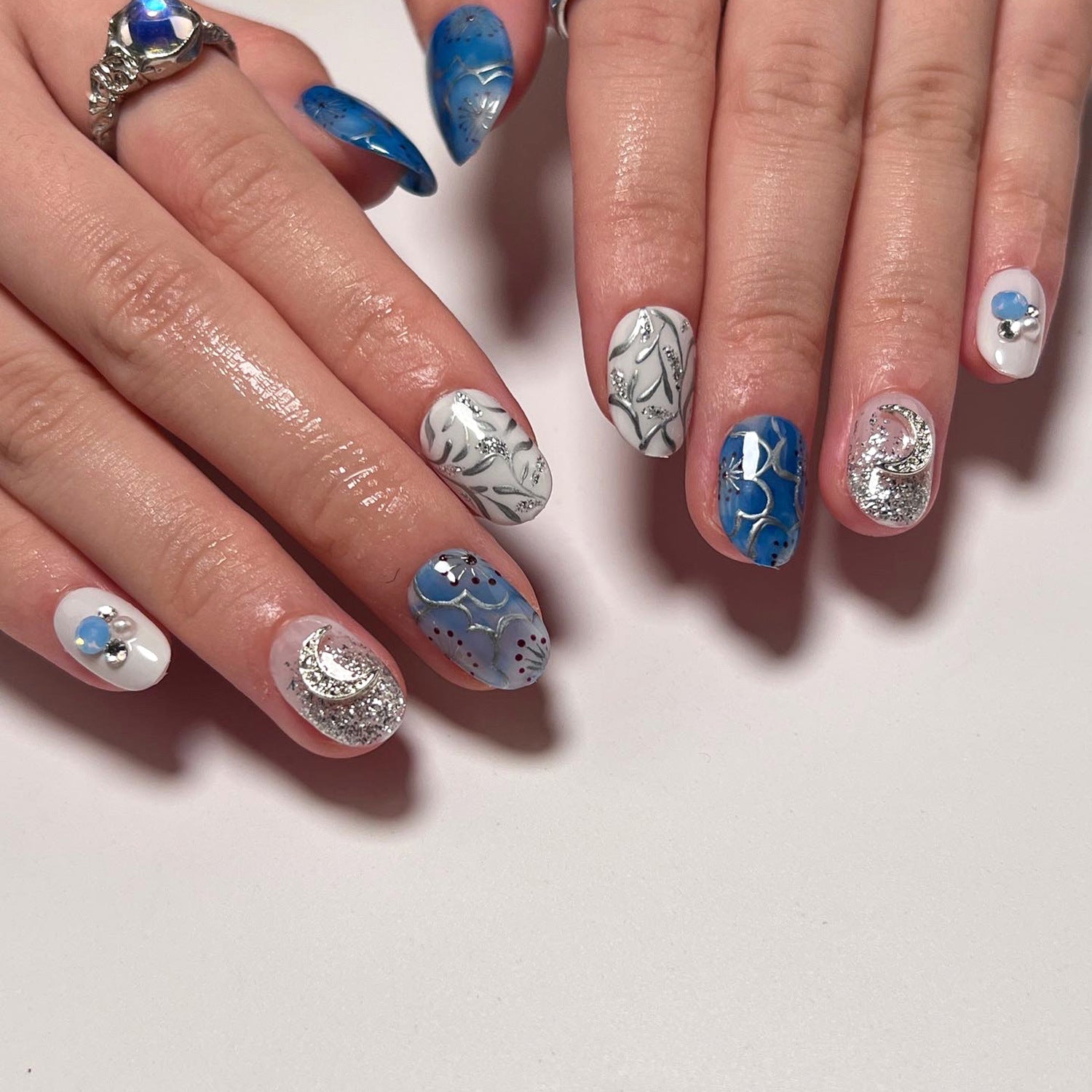 Floral Nail Art with Glitter Accents