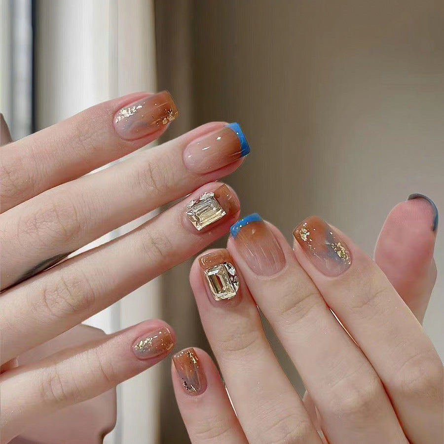 Elegant Nail Art with Gold Accents