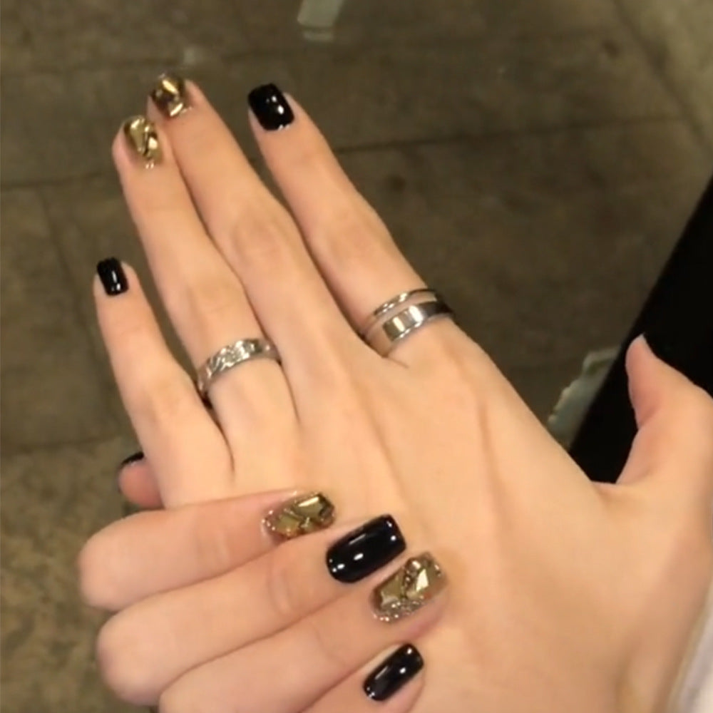 Elegant Black and Gold Nail Art