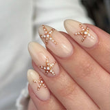 Nude Starfish Pearl Accent Nail Design