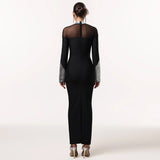 Evening Gown with Sheer Neck & Embellished Cuffs