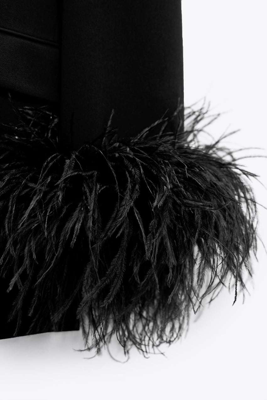 Chic Blazer with Feathered Cuffs