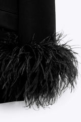 Chic Blazer with Feathered Cuffs