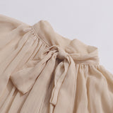 Ruffled Blouse with Flowy Sleeves