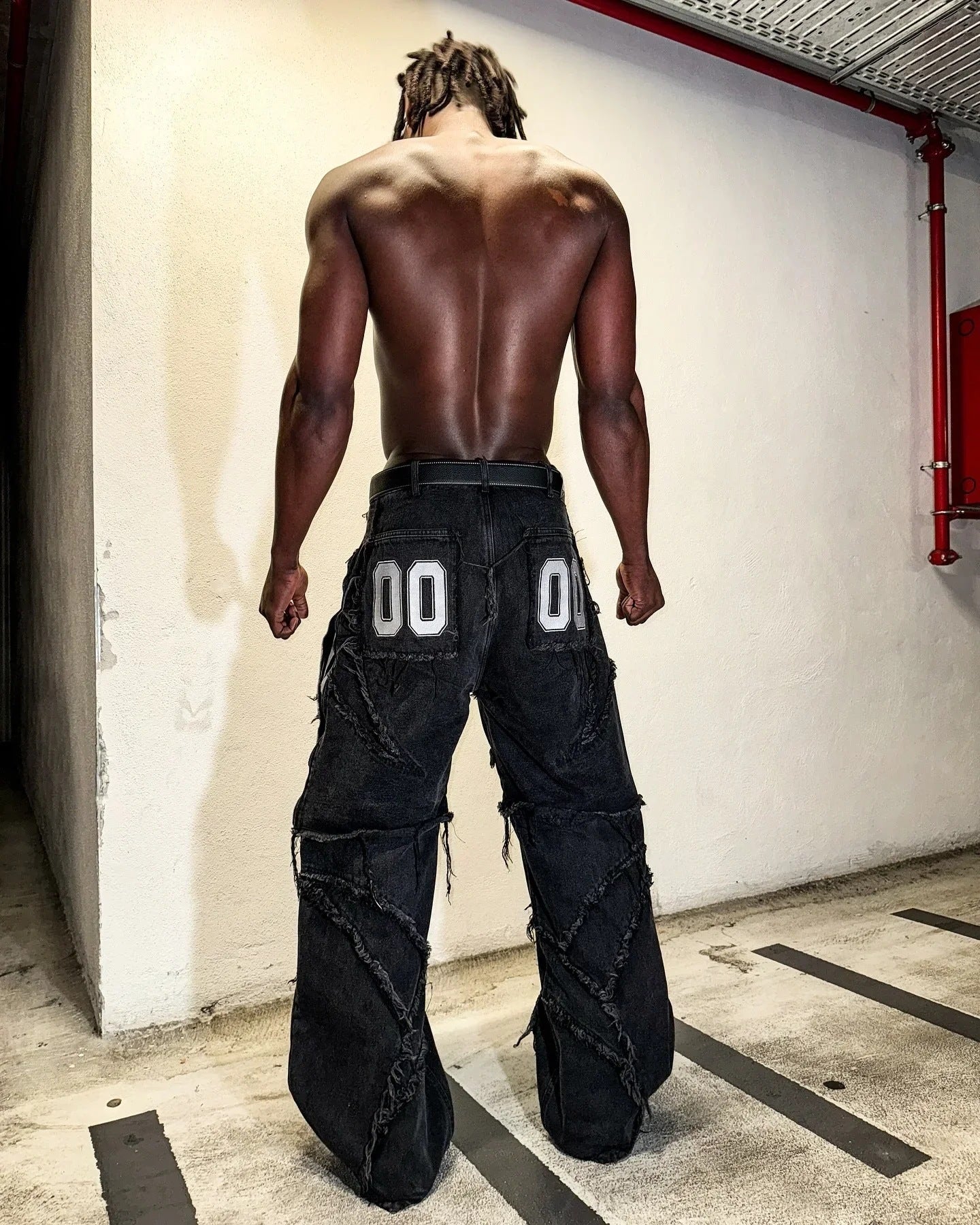 Black Distressed Cargo Jeans with Patch Details