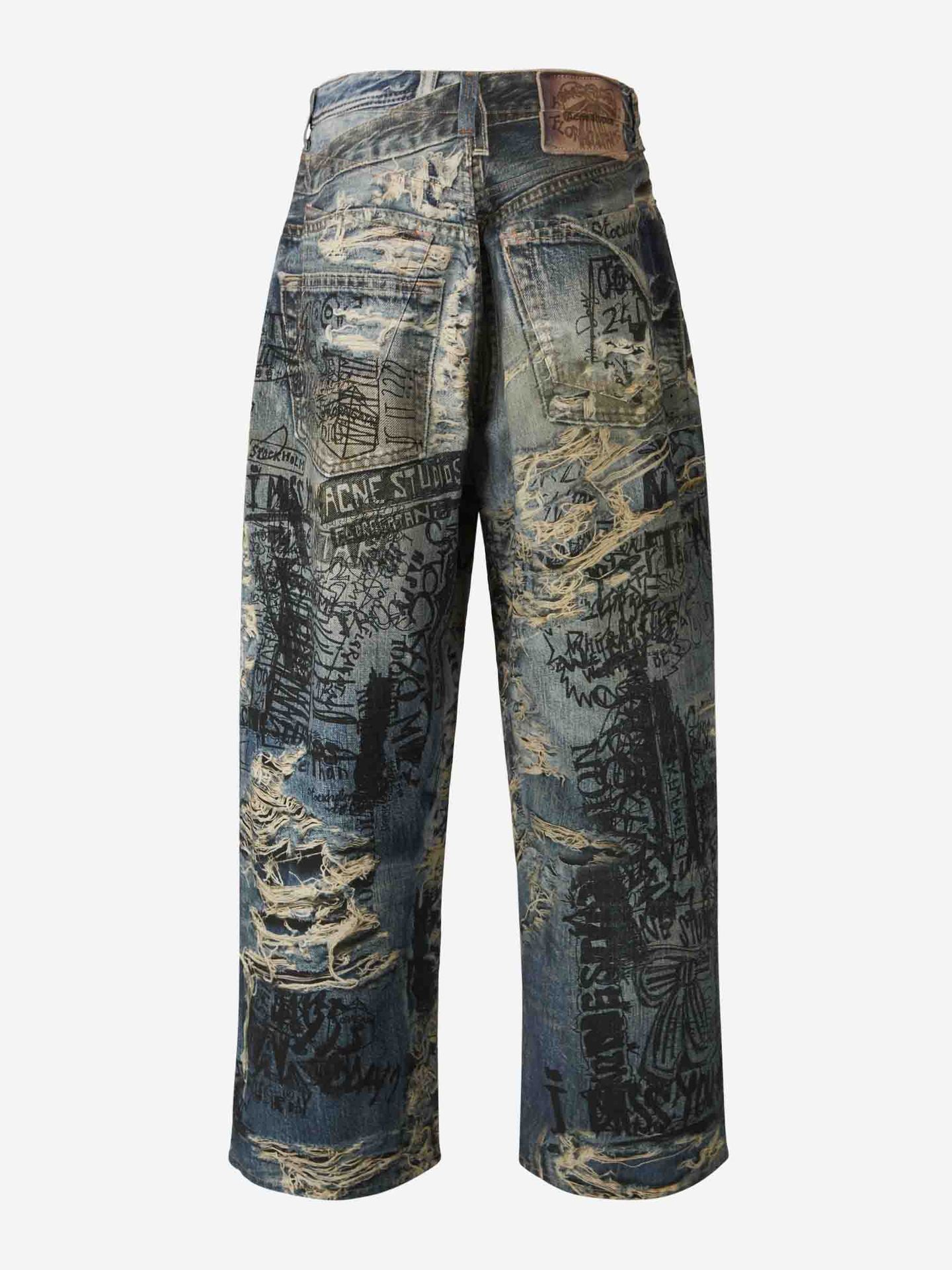 Avant-Garde Graffiti Print Ripped Jeans