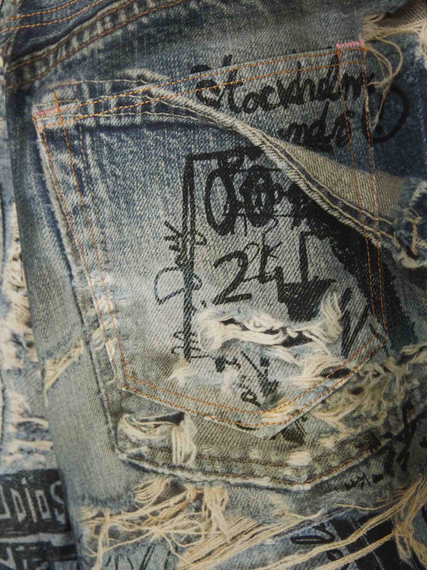 Avant-Garde Graffiti Print Ripped Jeans