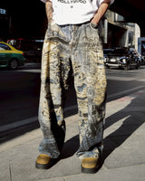 Avant-Garde Graffiti Print Ripped Jeans