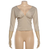 Elegant Deep V-Back Three-Quarter Sleeve Top
