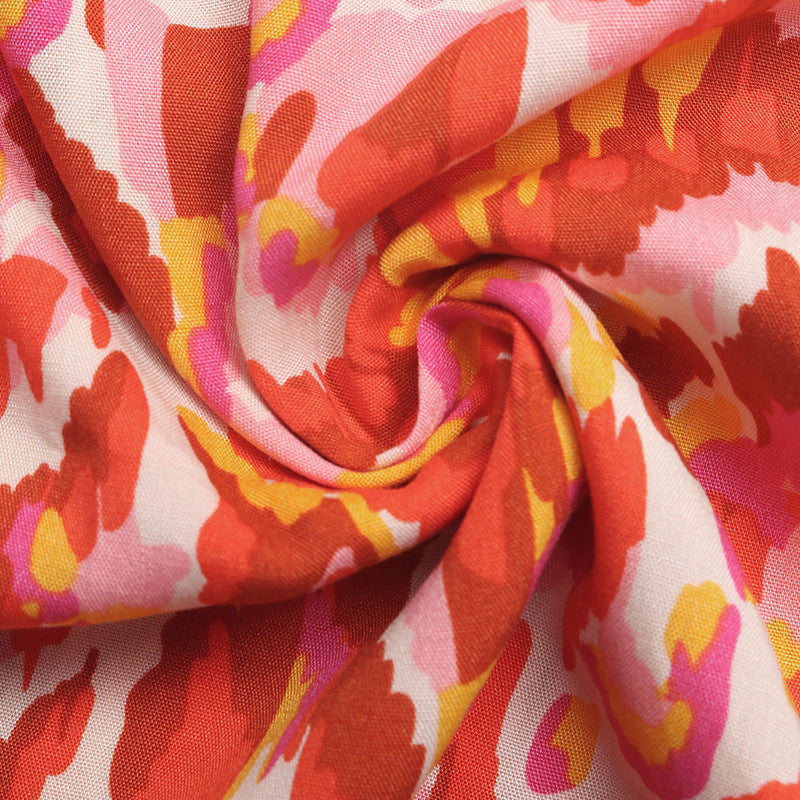 Abstract Warm-Tone Smocked Maxi Dress