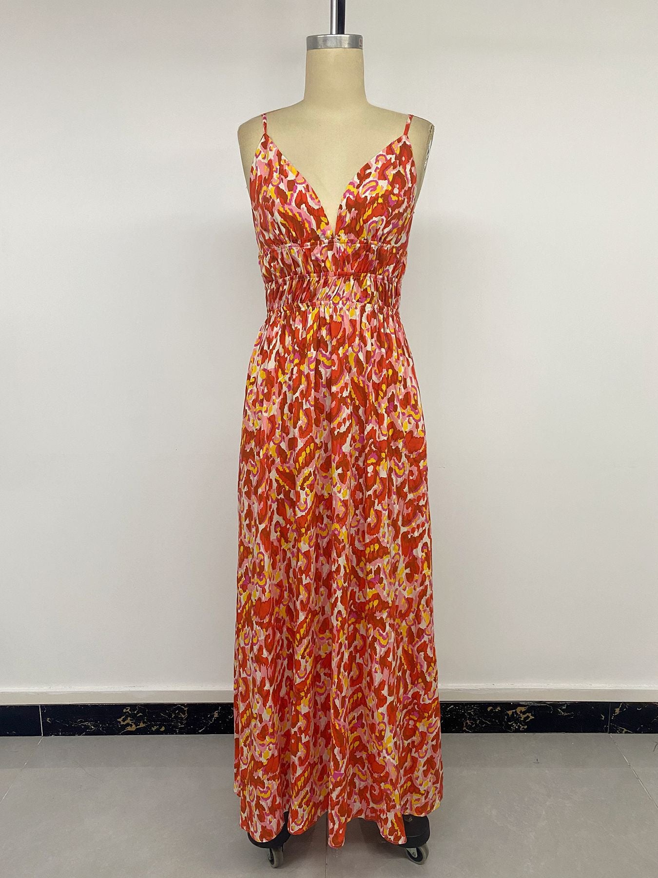 Abstract Warm-Tone Smocked Maxi Dress